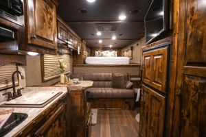 2026 3 horse Platinum Coach Outlaw 3 Horse Reverse Load with 13'8" LQ