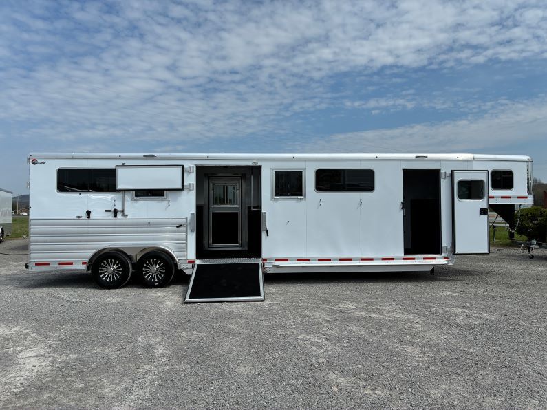 2026 Kiefer Built 4 horse head-to-head trailer with a tack room